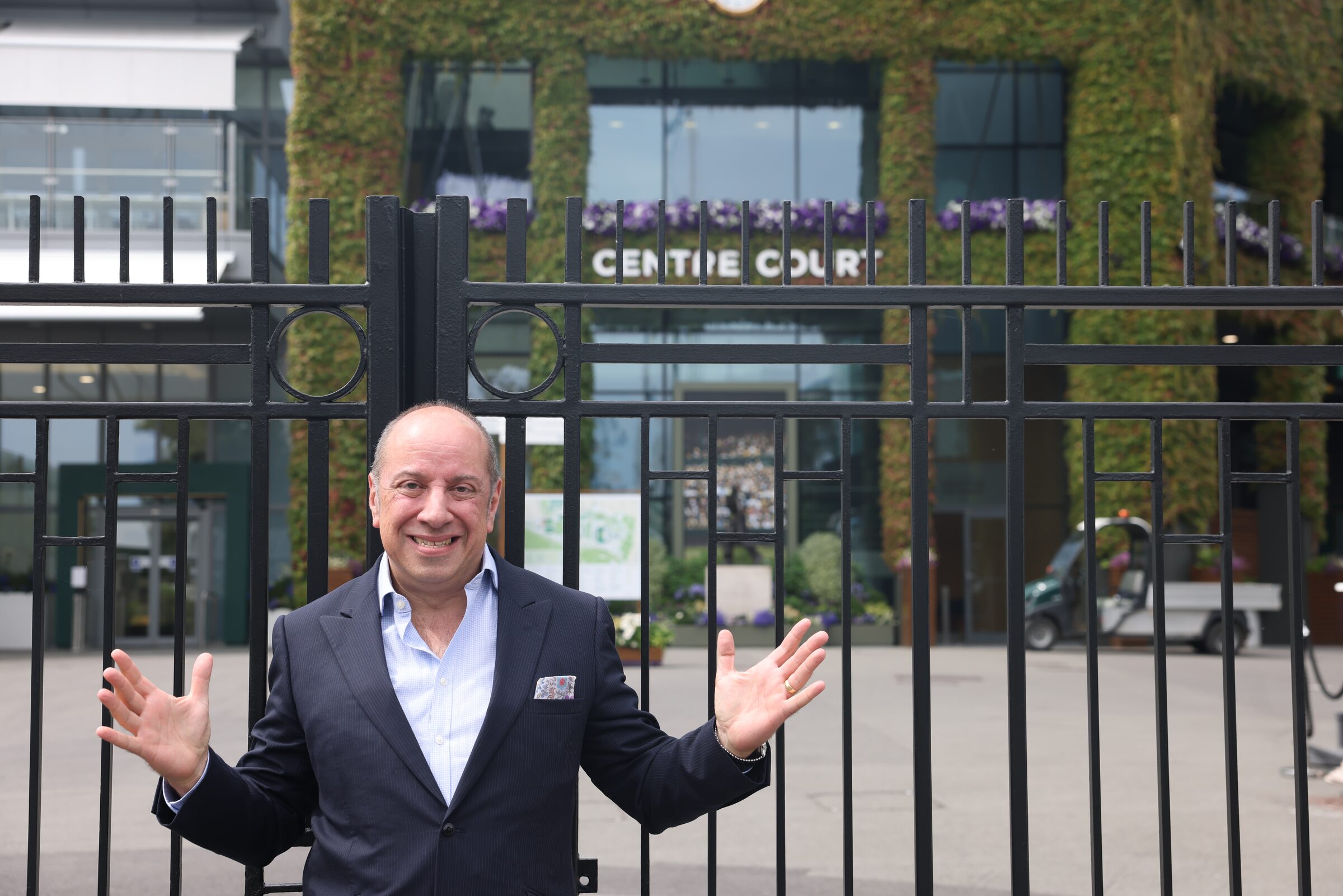 Zarir 'Zed' Vakil at the Centre Court gates, Wimbledon